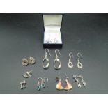 8 pairs of earrings some marked 925. (all pierced ears)  one pair boxed