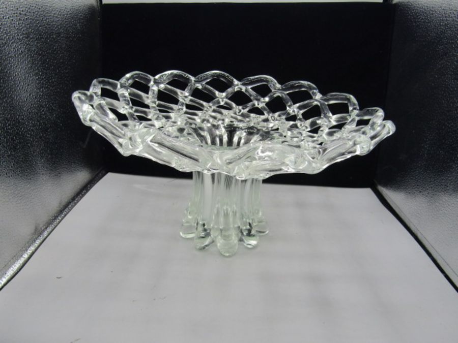 A large glass fruit basket