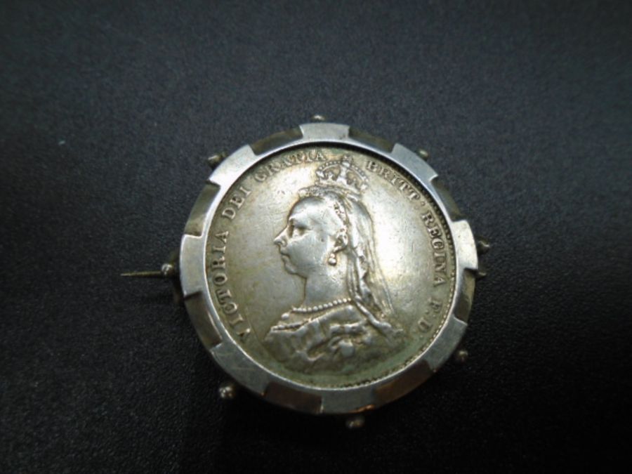 A sterling silver mounted shilling coin brooch . The shilling is dated 1887 Queen Victoria's - Image 2 of 4