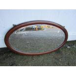 Oval mahogany framed wall mirror 44cm x 74cm approx