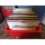 A red crate of LPs and few 45's