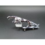 Chrome Jaguar car bonnet mascot, marked 7/24265/3WBB to the underside, approx 13cm long