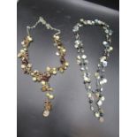2 long necklaces with mother of pearl and beads