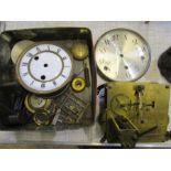A tin of vintage clock parts inc pendula, clock faces, a Westminster striking movement (working)