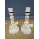 Pair of resin cherub table lights (plugs removed)