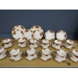 Royal Albert 'Country Roses' 32 pieces comprising 12 cups and saucers, 2 bowls, 3 cake plates, 2