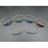6 White metal bangles, 4 with mother of pearl flower design and two others