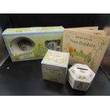 Wedgwood boxed Peter Rabbit breakfast set, boxed christening money box and book