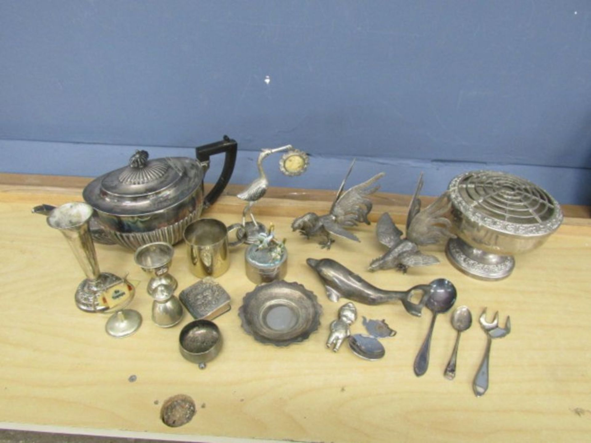 Mixed silver plate and white metal to include fighting cocks, baby rattle, teapot and rose bowl etc