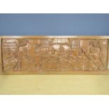 A treen carved plaque 107x37cm