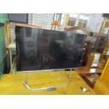 LG 55" Ultra HD LCD TV with remote from a house clearance