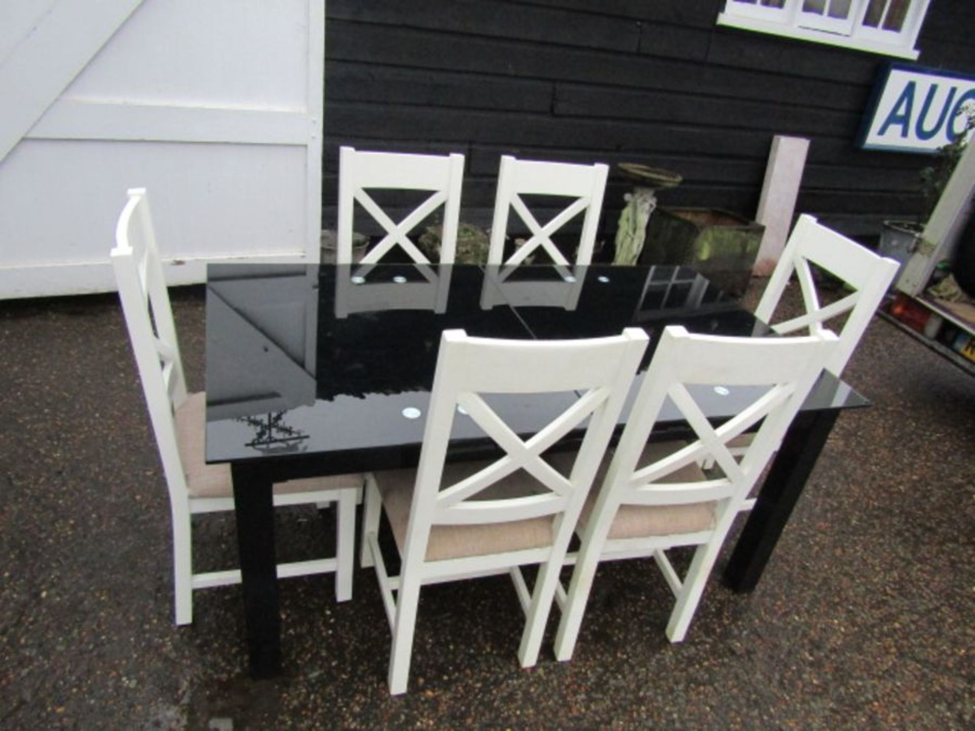 Modern black glass extending dining table with 6 upholstered chairs 165x90cm extending leak 50cm