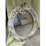 Very ornate oval wall mirror 50cm x 60cm approx