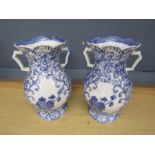 Pair of handled blue and white vases H24cm approx