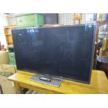Panasonic Viera 65" LCD TV with remote from a house clearance