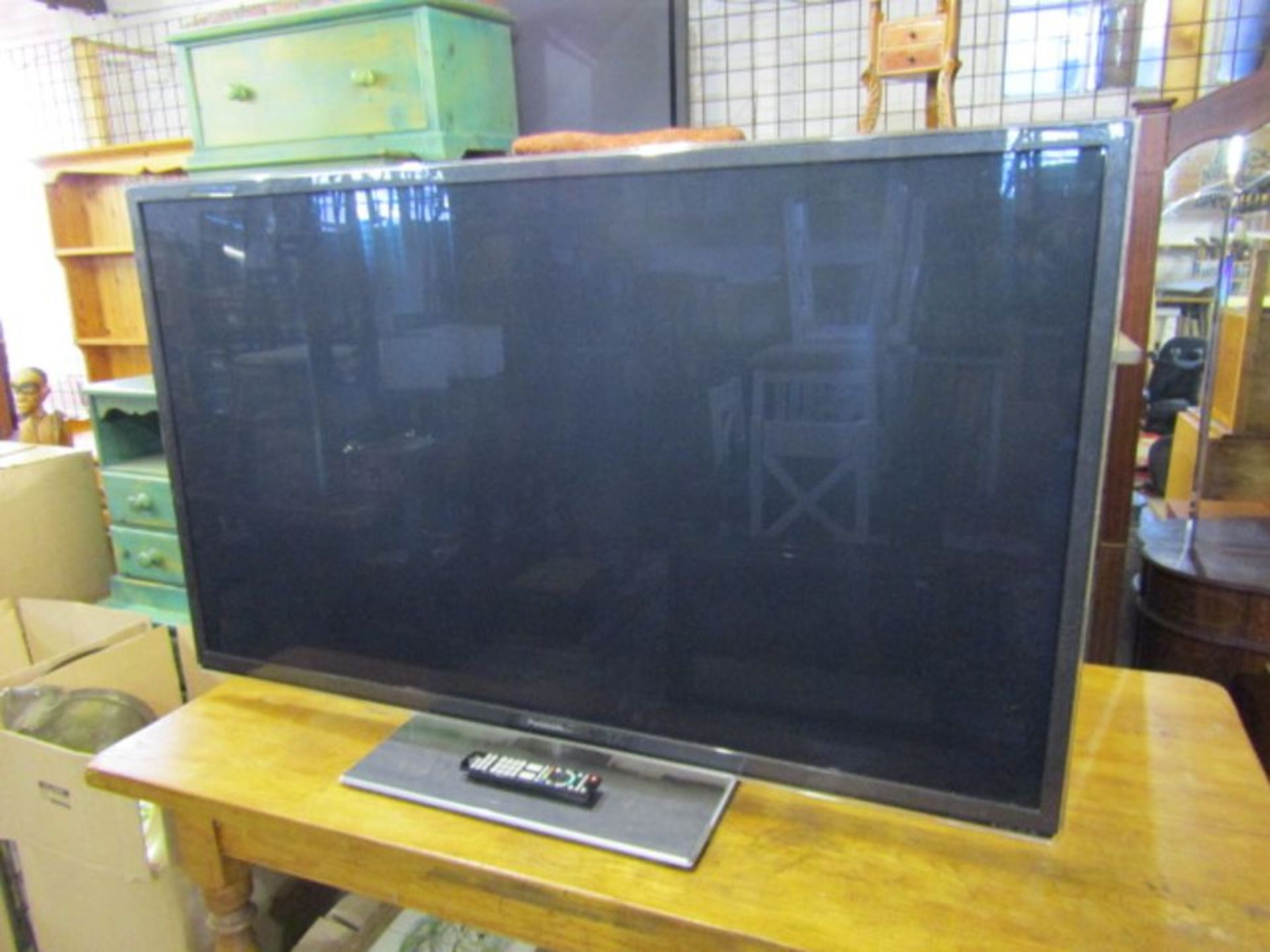 Panasonic Viera 65" LCD TV with remote from a house clearance