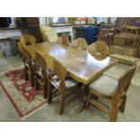 Very heavy solid oak Arts and Crafts style table with 8 chairs (one chair needs repairing as shown