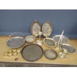 Mixed silver plated serving plates, napkin rings, candle sticks and rose bowl etc