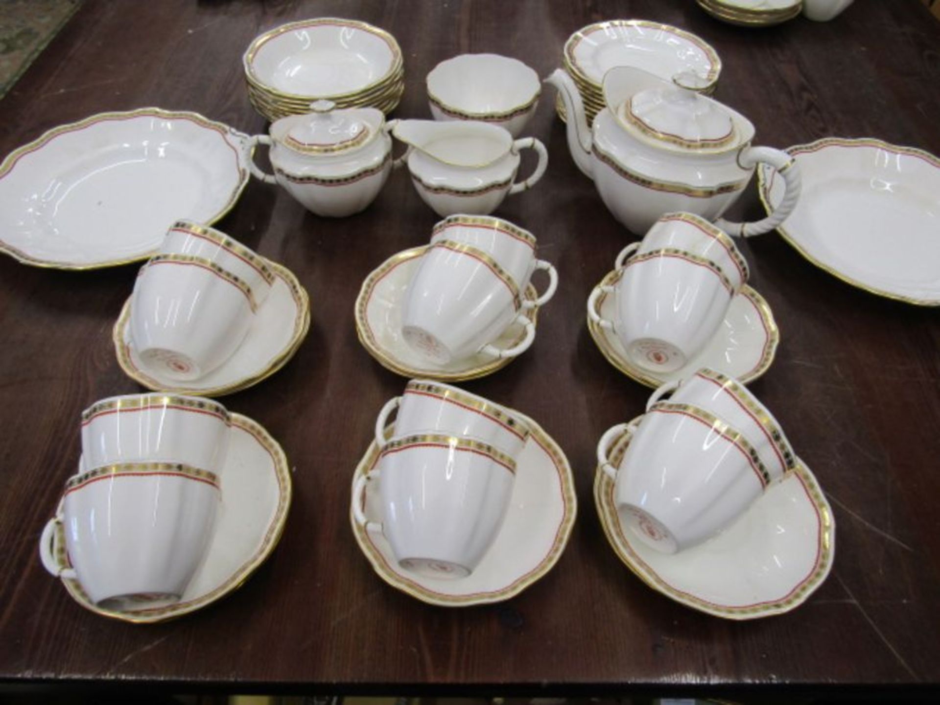 Royal Crown Derby Carlton Red pattern A1301 part tea service to incl 12 cups and saucers, 12 plates,