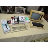 Vintage Amstrad computer with accessories