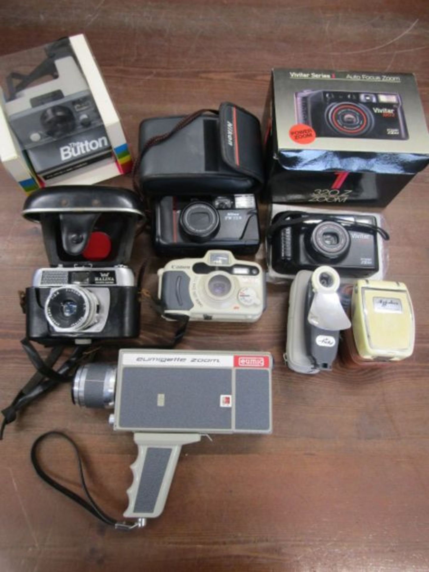 Collection of camera's- Nikon TW zoom, Polaroid land camera 'The Button', Halina Paulette