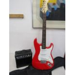 Legato elec guitar in slip with amp