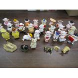 24 Piggies figurines along with a few other pig ornaments inc 3 brass pigs
