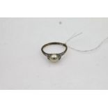 18ct white gold dress ring with a 7.2mm cultured pearl and three diamonds on each shoulder size U