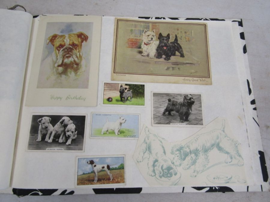 A scrap book of Dogs and the odd cat with loose transfers - Image 27 of 33