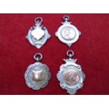 4 Football/sports fob medals 2 hallmarked Birmingham 1911 and 1921. The other 2 marked 'Silver'