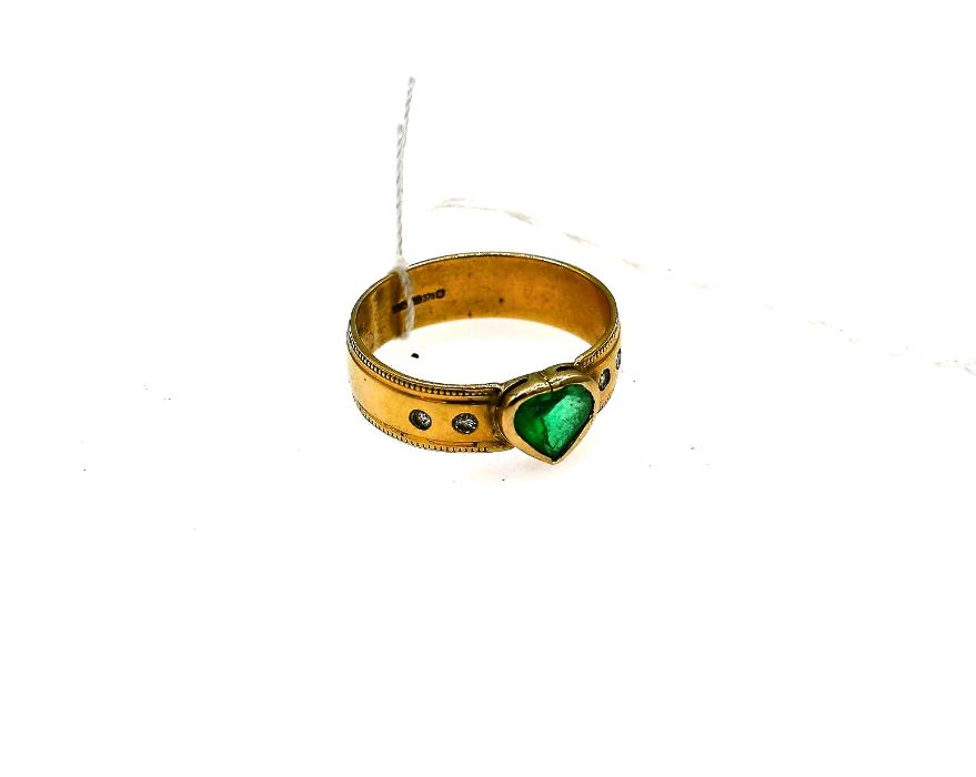 9ct gold dress ring with heart shaped emerald and two diamonds on each shoulder (total approx
