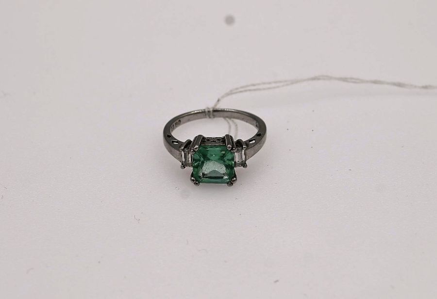 Silver dress ring with a square light green/blue stone and cubic zirconi's size P - Image 2 of 3