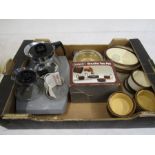 A coffee/tea set and ovenware dishes and ramekins