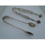 Two pairs of sugar tongs smaller hallmarked Glasgow 1898 by James Weir 30g, larger pair has the lion