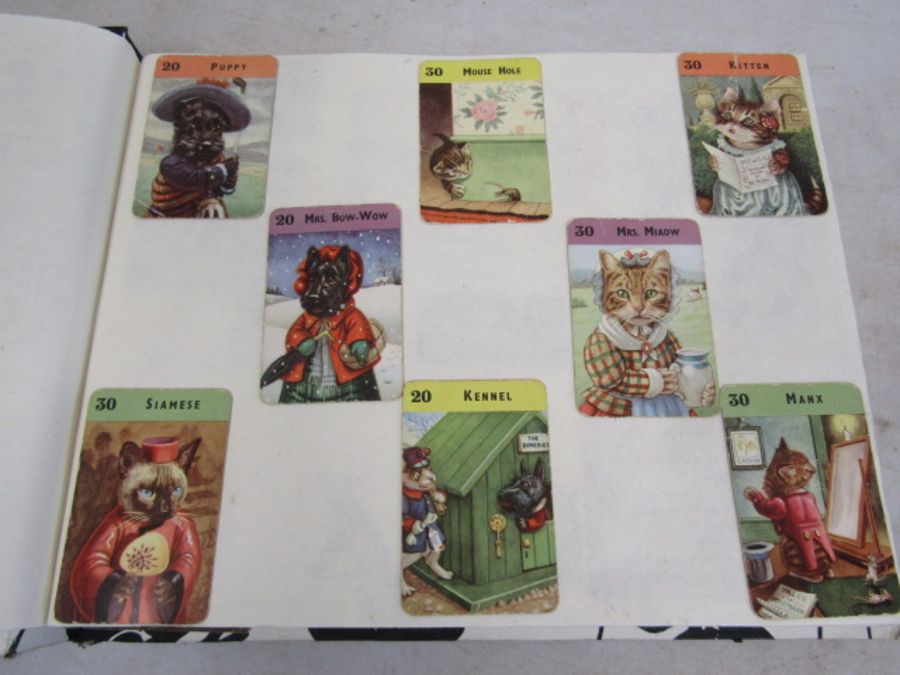 A scrap book of Dogs and the odd cat with loose transfers - Image 7 of 33