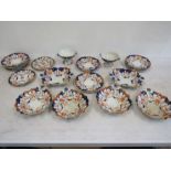 Imari pattern part dinner set comprising 2 footed bowls with stand plates,, 4 deep bowls, 9