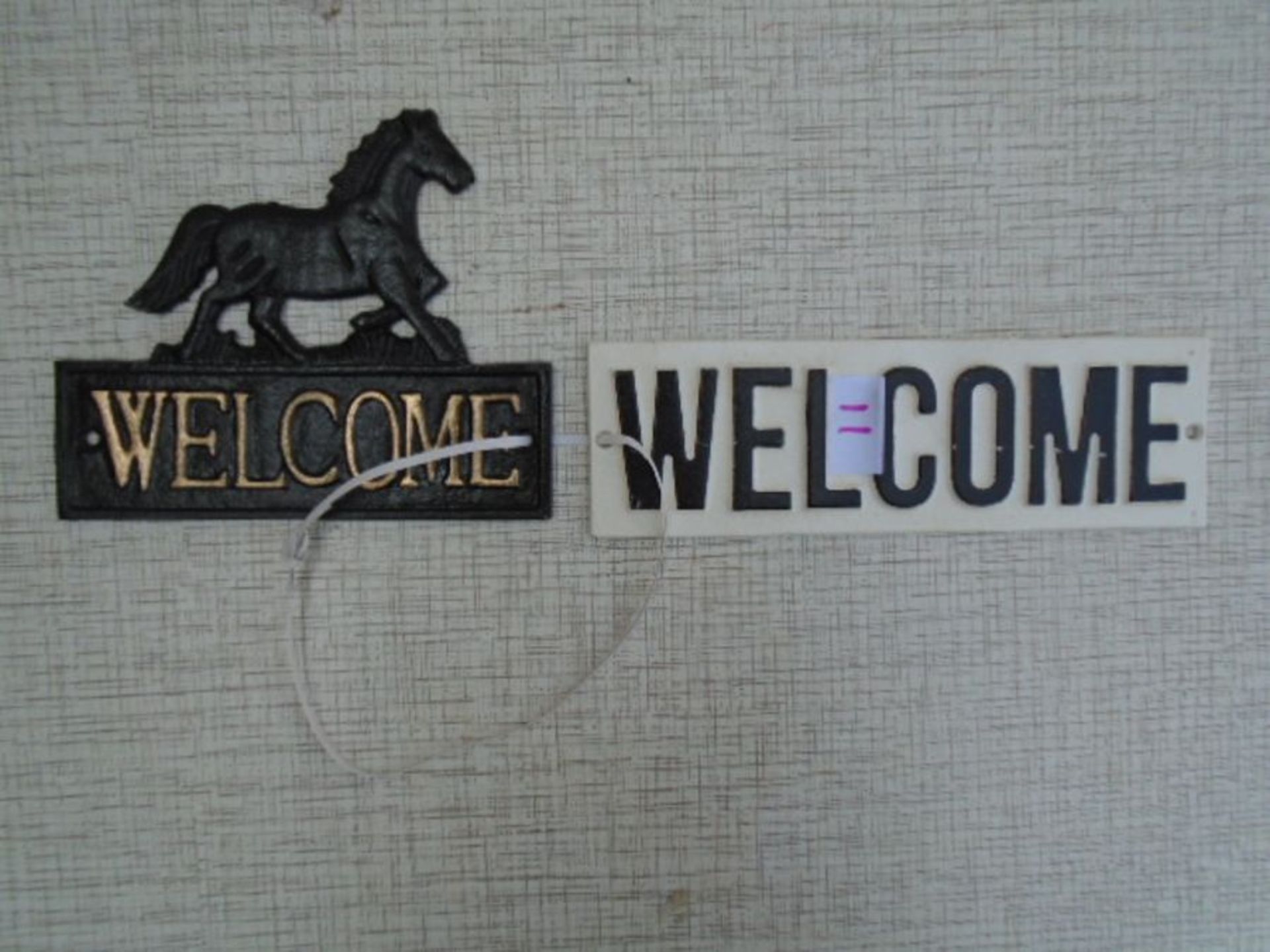 2 welcome signs