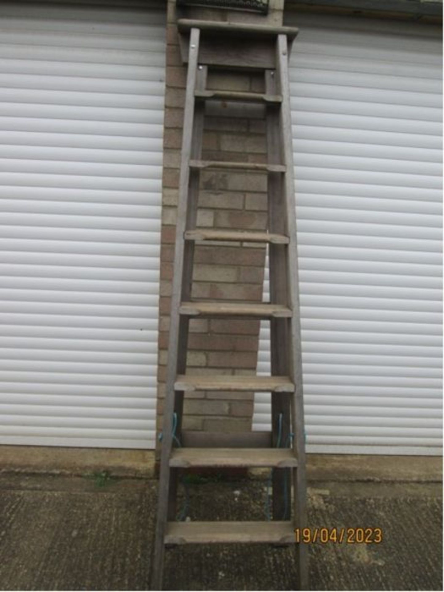 Tall heavy wooden step ladder