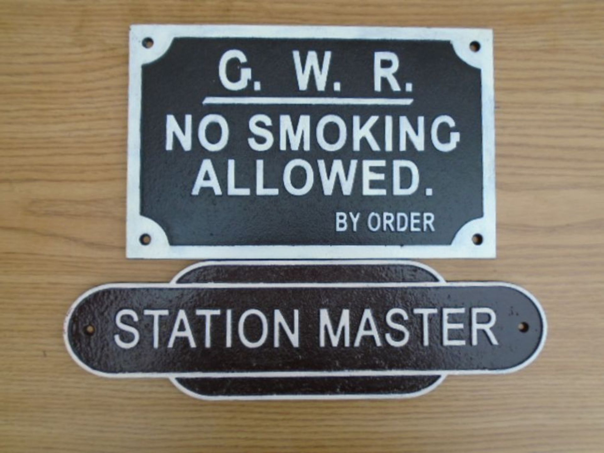 Station master & no smoking signs