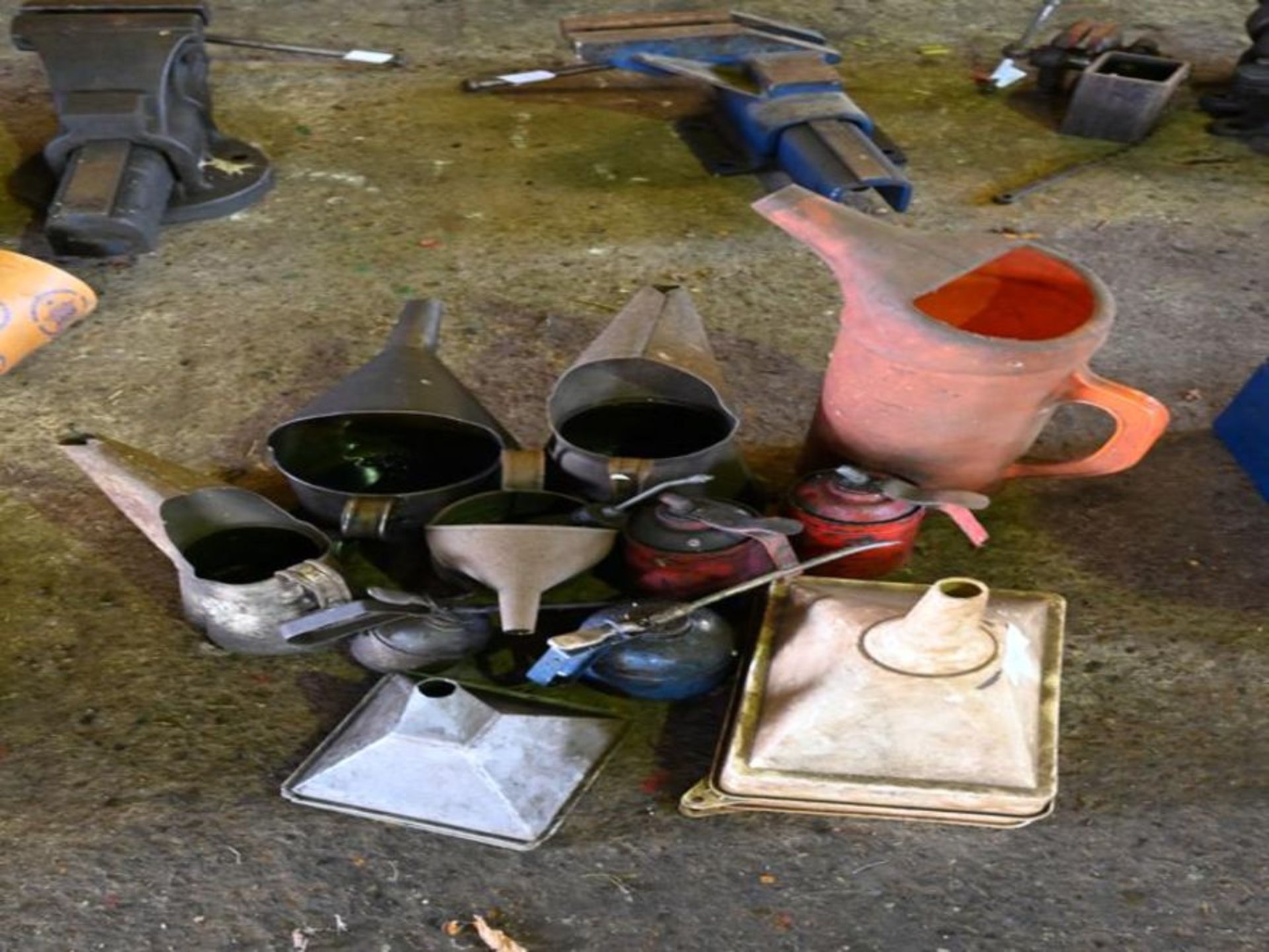 Quantity vintage oil jugs and cans