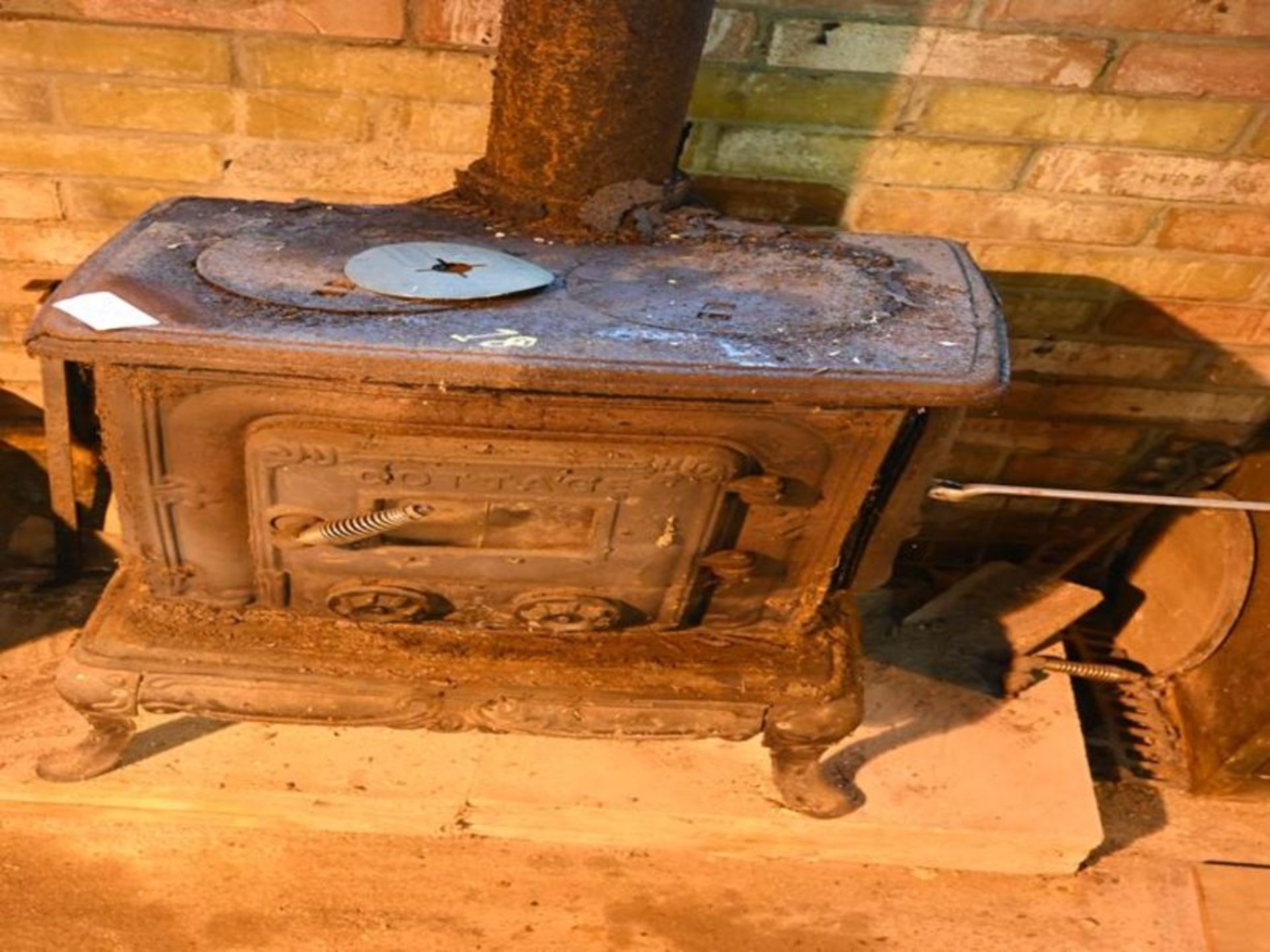 Vintage Newport cottage cast iron woodburning stove