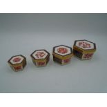 4 Royal Crown Derby Graduated Boxes and Covers, of hexagonal form, each decorated with dragons and