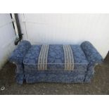 Upholstered storage window seat with cushions