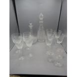 2 decanters and various glasses