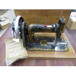 Frister and Rossman vintage sewing machine in box with key