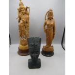 2 carved figures and a resin tribal bust