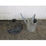 Galvanised watering can and plant holder