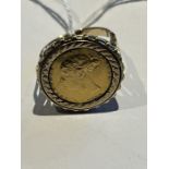 Gold Half Sovereign ring, Victoria Young Head Half Sovereign 1880, set in a 9 carat yellow gold