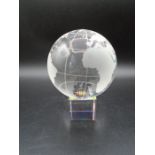 Glass globe on stand