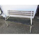 Garden bench with ornate cast iron ends